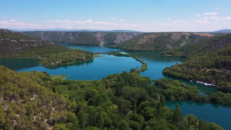 Stunning-aerial-view-flying-forward-across-Krka-National-Park-lakes-and-waterfalls-in-Dalmatia,-Croatia-filmed-in-4k