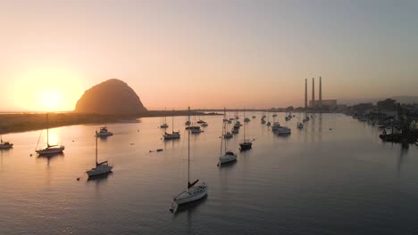 Calmly-hovering-over-the-harbor-of-morro-bay-california-waiting-for-sunset