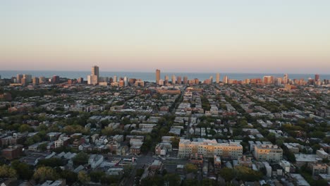 Drone-Flies-Above-Chicago-Neighborhood-towards-Lakeview,-Home-of-the-Chicago-Cubs