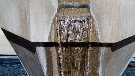 Waterfall-fountain-shining-transparent-stream-of-water