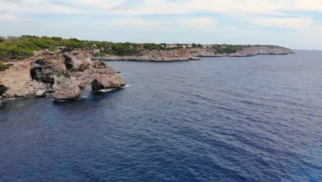 The-beautiful-drone-shot-of-the-coast-and-blue-sea-in-Mallorca