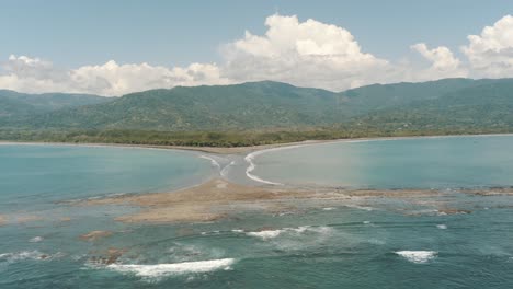 Drone-aerial-wide-close-view-of-whale's-tail-beach-in-Costa-Rica