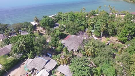Aerial-shot-of-a-Thai-village-on-an-tropical-Island-in-the-gulf-of-Thailand