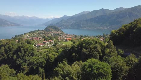 luxury-Villa-terrace-overlooking-a-beautiful-lake-and-mountain-range-in-Italy,-Bellagio,-Como