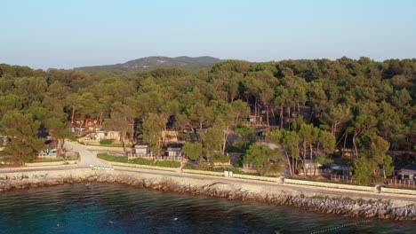 Aerial-slow-shot-of-the-coast-of-Mali-Losinj-with-wooden-houses-for-the-summer