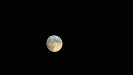 Time-Lapse-Of-Full-Moon-Moving-And-Changing-Colour-In-Night-Sky