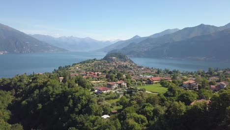 Beautiful-lake-and-mountain-range-with-a-small-village-in-Italy,-Bellagio-at-Lago-di-Como