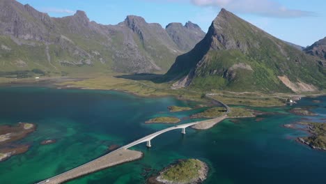 Aerial-View-of-Road-and-Bridge-at-Scenic-Lagoon-of-Lofoten-Archipelago,-Norway