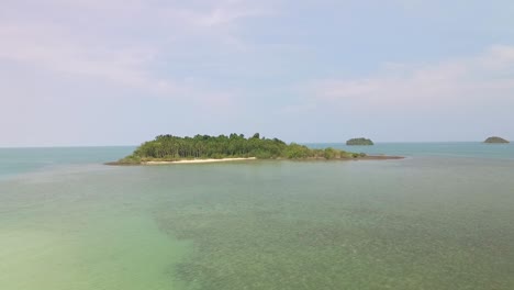Tranquil-exotic-Koh-Chang-paradise-islands-in-turquoise-ocean-seascape-aerial-view-rising