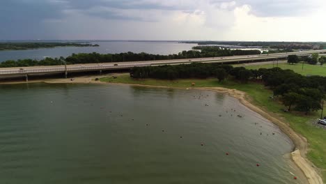 Aerial-video-of-people-swimming-at-Copperas-Branch-Park-on-Lake-Lewisville-in-Lewisville-Texas