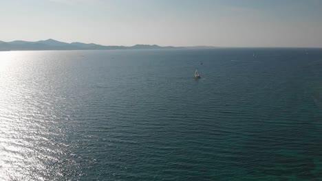 Summer-sunny-day-on-the-Adriatic-with-sailboats-and-Zadar-city,-beach-and-coastal-walkway