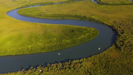 Boats-on-Daintree-River,-Queensland-Australia,-aerial-view