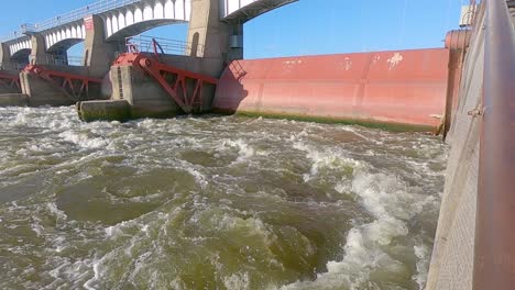 Dam-14-and-turbulent-downstream-water-of-the-Mississippi-River,-Hampton-Illinois