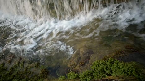 Catching-a-waterfall-in-a-small-freshwater-channel