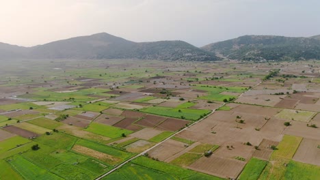 Drone-shot-of-agriculture-farm-fields-in-Lastihi,-Crete,-Greece
