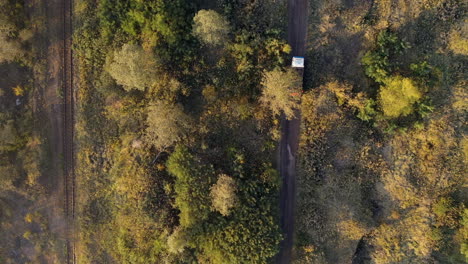 Steady-drone-shot-of-a-trick-driving---dirt-road-in-hungary