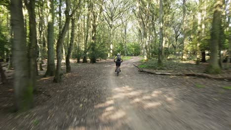 Drone-Fast-tracking-Mountain-biker-through-Epping-forest