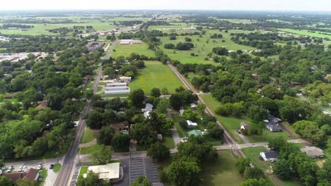 This-is-an-aerial-video-of-the-city-of-Pilot-Point-in-Texas-flying-south