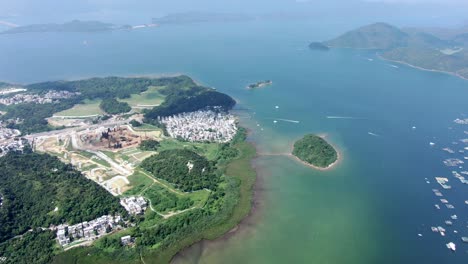 Hong-Kong-Tseng-Tau-Tsuen-waterfront-houses,-Aerial-view