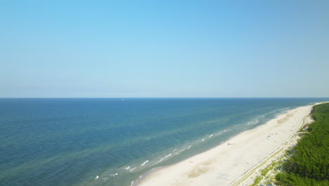 Calm-And-Beautiful-Turquoise-Sea-And-White-Sand-Beach-In-Osetnik-Beach-Poland---Aerial-shot