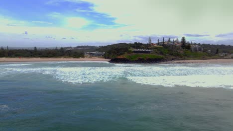 Waves-Running-Ashore-In-Sharpes-Beach---Seascape-In-Skennars-Head---NSW,-Australia---drone-shot
