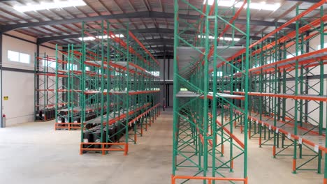 Empty-warehouse-with-racked-pallets