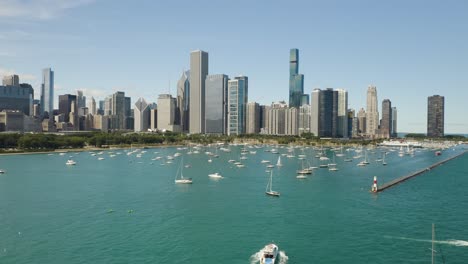 Yachts-Sail-on-Lake-Michigan-on-Beautiful-Summer-Day,-Chicago-Skyline-in-Background