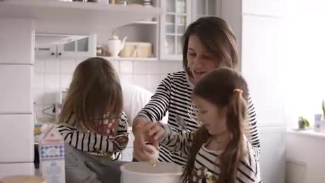 Beautiful-family-are-cooking-together-on-the-kitchen