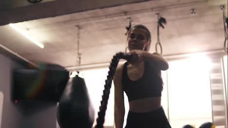 Footage-of-female-battle-ropes-workout.