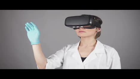 Young-female-doctor-watching-computer-tomography-shot-using-vr-headset.-Healthcare-concept.-Shot-in-4k