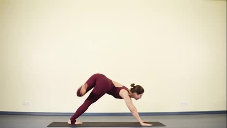 Young-attractive-woman-practising-yoga-asanas-to-stay-fit-and-healthy.-Downward-dog.