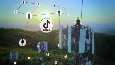 Engineer-on-telecom-tower-using-tablet-with-TikTok-icon-connecting-people