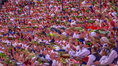Timelapse-of-crowd-cheering-in-historical-costumes-for-the-latvia-Song-and-dance-festival