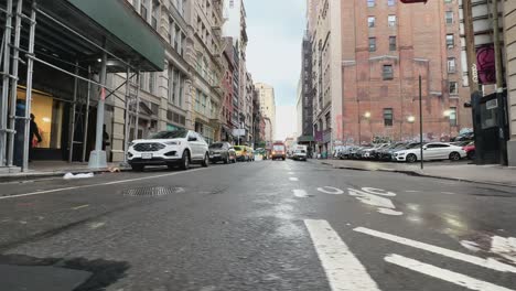 Low-Angle-POV-Walking-Across-Street-In-New-York