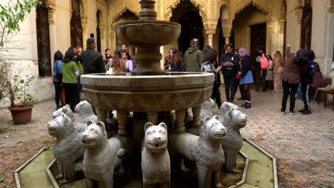 Hand-Held-Shot-Inside-Alhambra-Palace-at-Santiago-Chile-Historic-Citadel-Lions-Fountain-Architecture