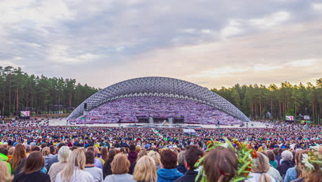 Open-sky-stage-for-traditional-dance-and-music-festival-of-Latvia,-time-lapse