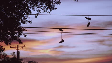 Tennis-Shoes-Hanging-on-Neighborhood-Wires