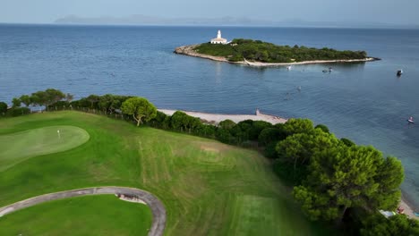 Flying-over-Alcanada-golf-course-tot-the-lighthouse-on-an-island