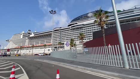 MSC-Grandiosa-cruise-ship-docking-at-Barcelona-cruise-port-terminal,-Spain