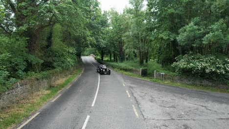 Beautiful-vintage-car-turning-at-Kilkea-Village-Kildare-Ireland-on-a-vintage-car-event-early-summer