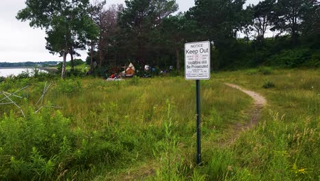 Warning-sign-not-to-enter-already-established-camp-site