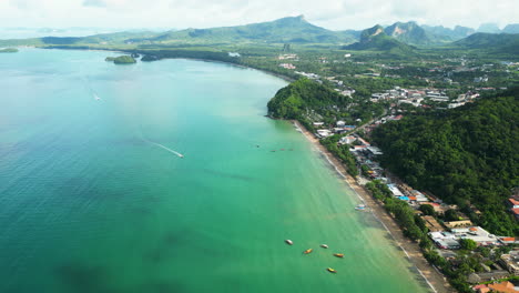 Aerial-of-the-tropical-coast-of-Ao-Nang,-Krabi,-Thailand-on-bright-day