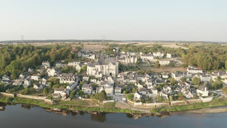 Aerial-drone-point-of-view-of-the-village-of-Candes-Saint-Martin-on-the-confluence-of-the-Loire-and-Vienne-rivers-in-central-France