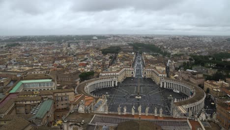 A-breathtaking-establishing-shot-of-the-beautiful-cityscape-of-the-Vatican-City-from-the-top-of-St-Peter’s-Basilica,-Rome,-Italy