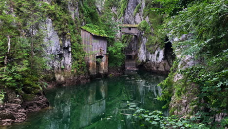Scropoasa-lake,-old-river-dam-tourist-attraction