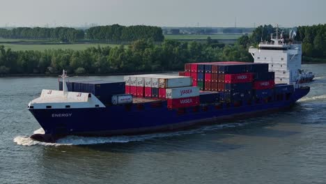 Large-container-ship-at-sea-loaded-with-containers-for-offshore-supply,-Aerial-shot