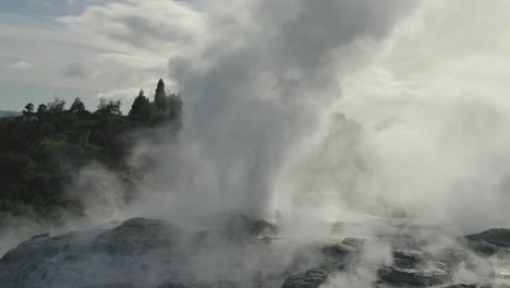 Rotorua-geothermal-geyser-erupting,-New-Zealand,-Slow-motion-wide-shot