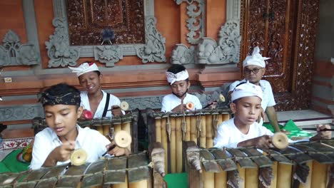 Kids-Play-Gamelan-Gender-Orchestral-Music-at-Temple-Ceremony-Bali-Indonesia-Art-Traditional-at-Island-of-Gods