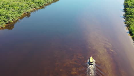 Boat-sailing-at-Amazon-River-at-Amazon-Forest,-Amazonas-Brazil