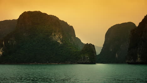 Majestic-limestone-peaks-illuminated-by-the-evening-glow-in-Ha-Long-Bay